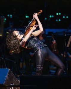 Sandy Cameron performs with EMBRACE as violin mic