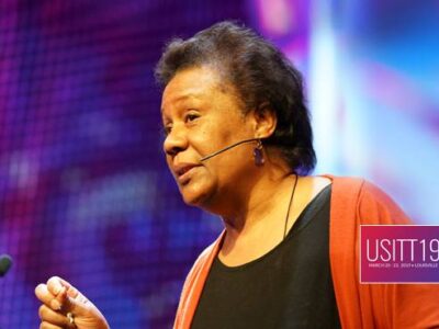 USITT 2019 Keynote speaker Jackie Taylor wears the CO2 Confidence headset microphone